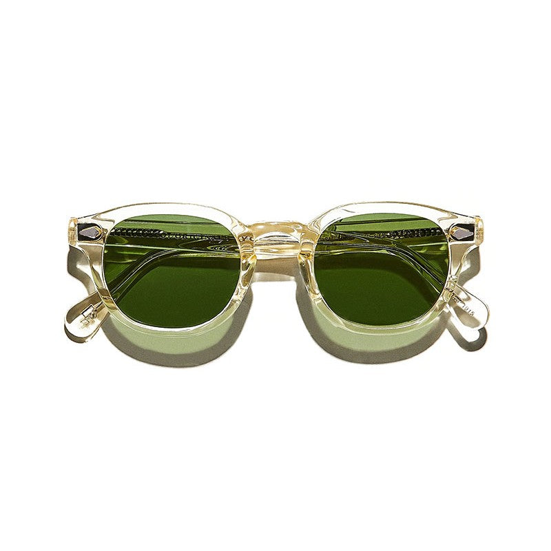 Lunettes Moscot LEMTOSH Flesh reconditionnées par Vitamines D avec monture transparente et verres solaires verts